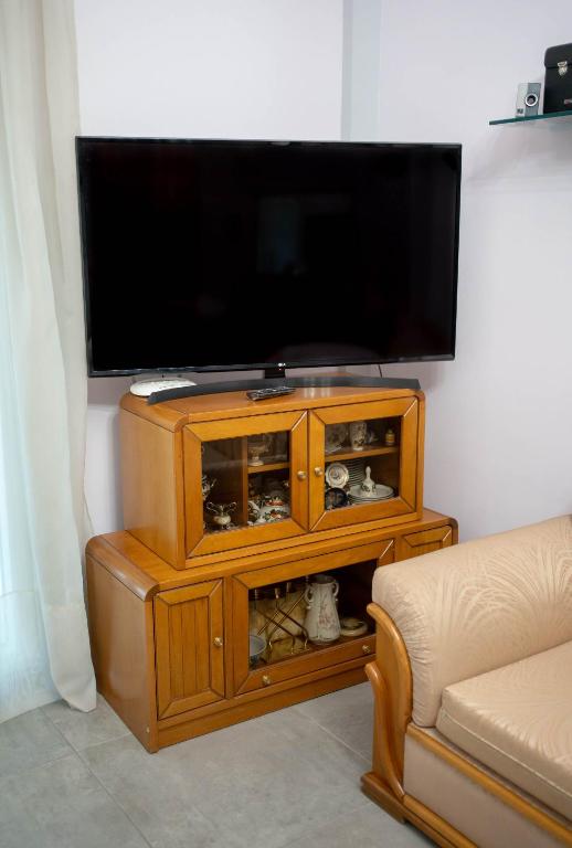 A television and/or entertainment centre at BYT Downtown Flat