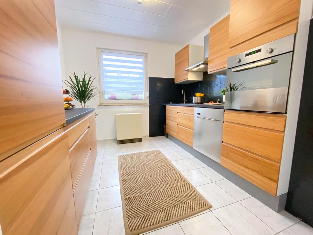 Kuchyň nebo kuchyňský kout v ubytování Apartment Mozart