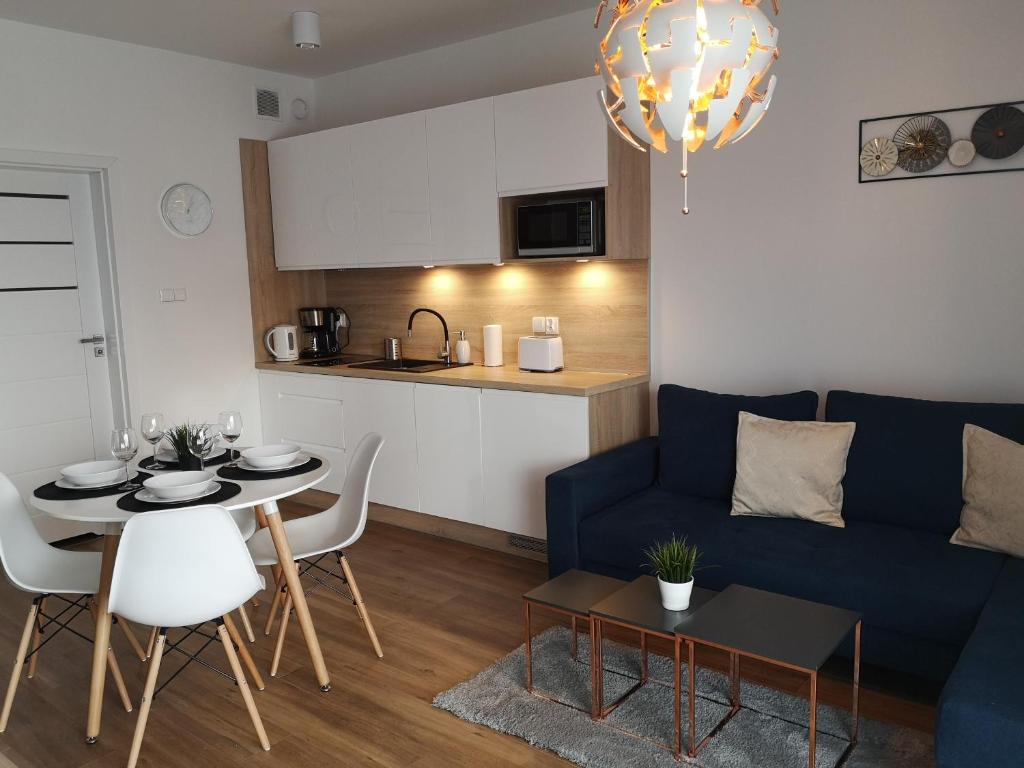 Kuchyň nebo kuchyňský kout v ubytování Apartament Piaskowy Sunset Resort