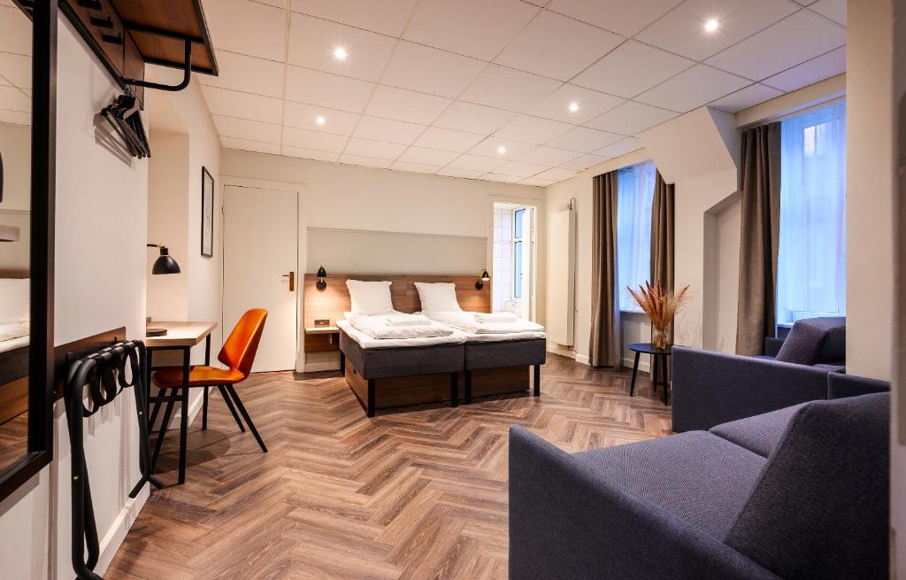 Postel nebo postele na pokoji v ubytování Go Hotel Saga