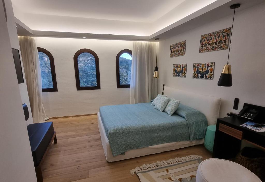 Postel nebo postele na pokoji v ubytování Hotel delle Rose a Luxury Boutique Hotel