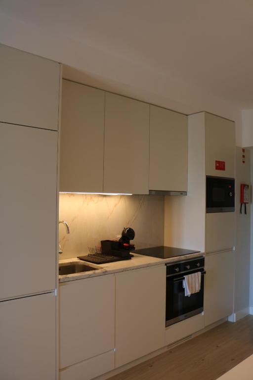 A cozinha ou kitchenette de Villa Graça -Hostels and Apartments