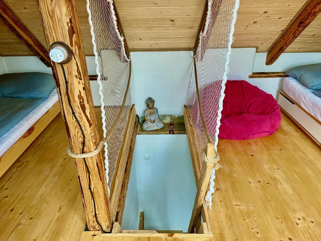 Łóżko lub łóżka w pokoju w obiekcie Apartmány pod Kozákem