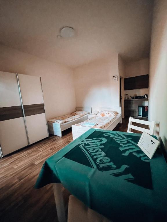 Postel nebo postele na pokoji v ubytování Penzion Na Vošverku