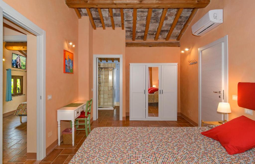 Posteľ alebo postele v izbe v ubytovaní Dolce Vita in Tuscany B&B