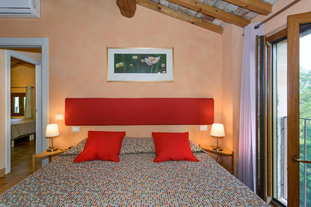 Posteľ alebo postele v izbe v ubytovaní Dolce Vita in Tuscany B&B