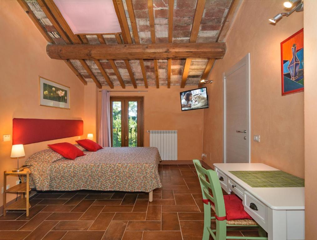 Posteľ alebo postele v izbe v ubytovaní Dolce Vita in Tuscany B&B