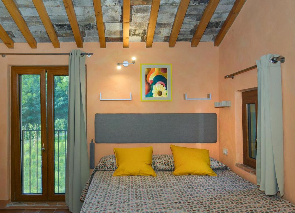 Posteľ alebo postele v izbe v ubytovaní Dolce Vita in Tuscany B&B