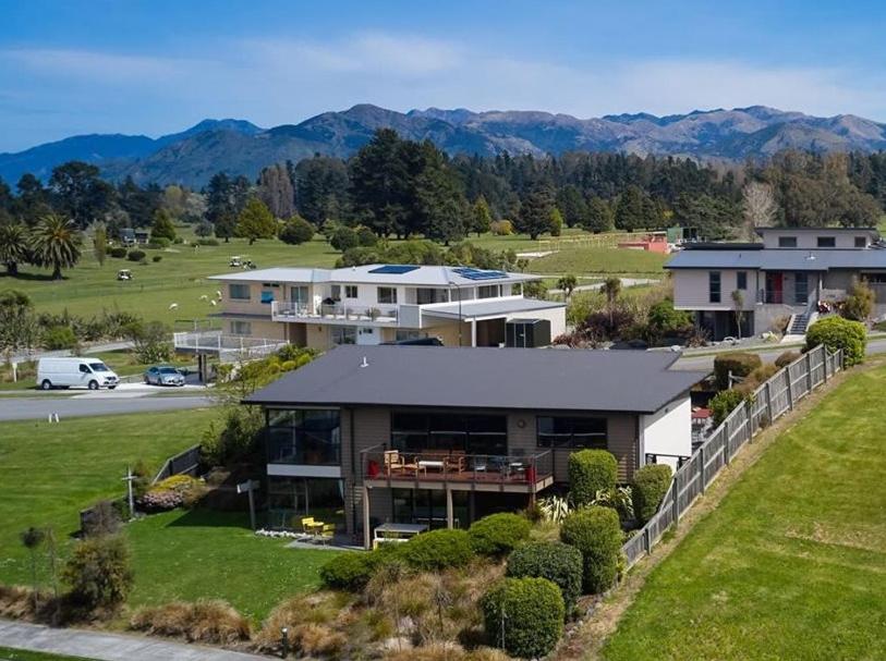 an aerial view of a large house with a yard at Executive Home in Kaikoura