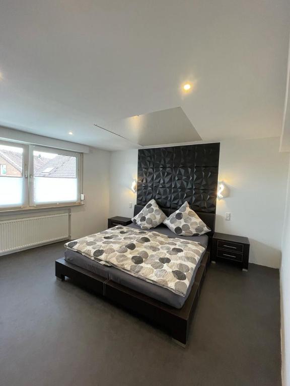 Postel nebo postele na pokoji v ubytování My Home Deluxe Ferienwohnung Sauna