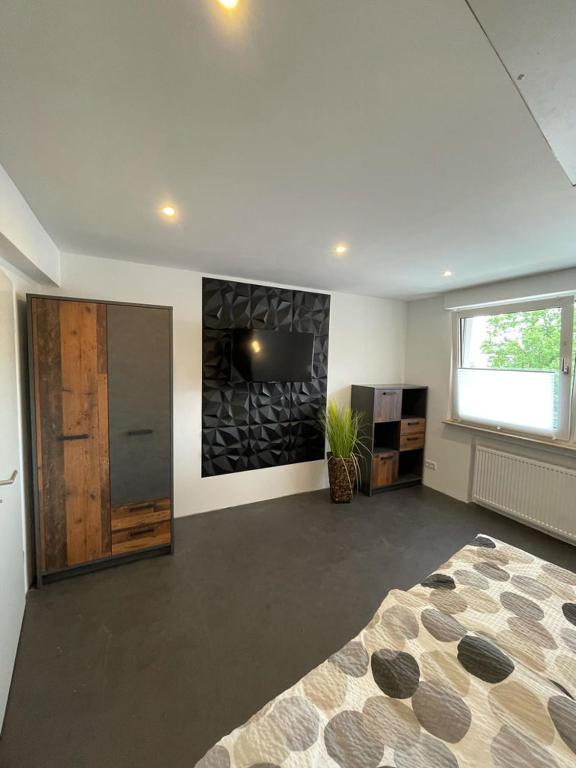 Postel nebo postele na pokoji v ubytování My Home Deluxe Ferienwohnung Sauna