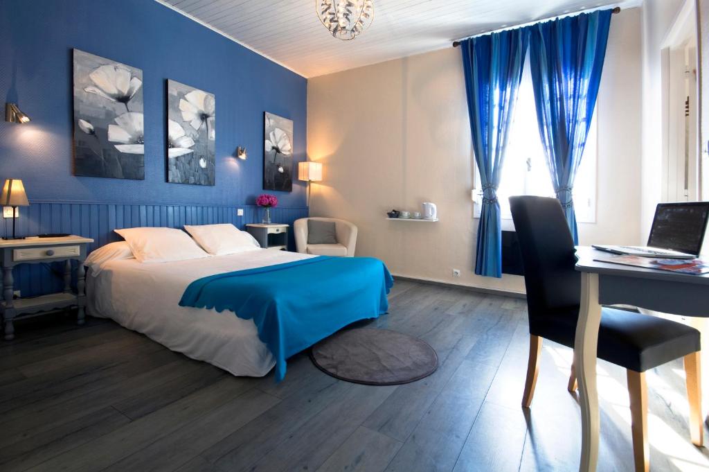 Postel nebo postele na pokoji v ubytování Hôtel Bellevue