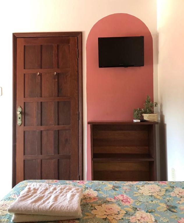 Postel nebo postele na pokoji v ubytování Pousada Morro Bello