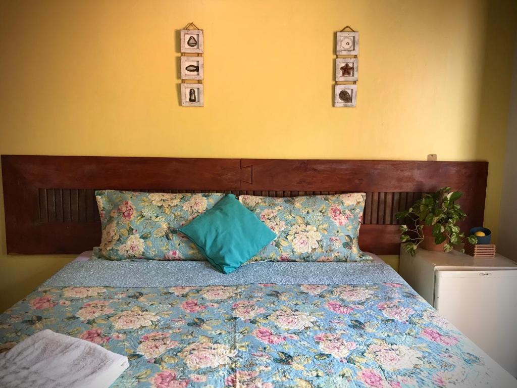 Postel nebo postele na pokoji v ubytování Pousada Morro Bello
