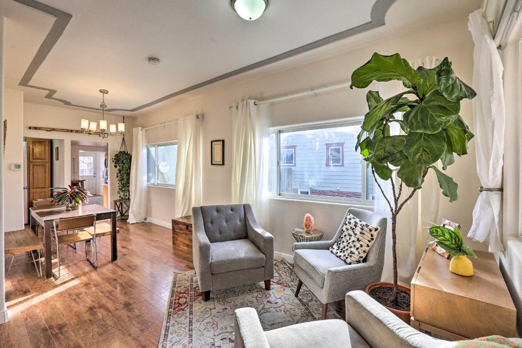 a living room with a couch and a chair at 1/2 Mi to Tennyson: Pet-Friendly Denver Gem in Denver