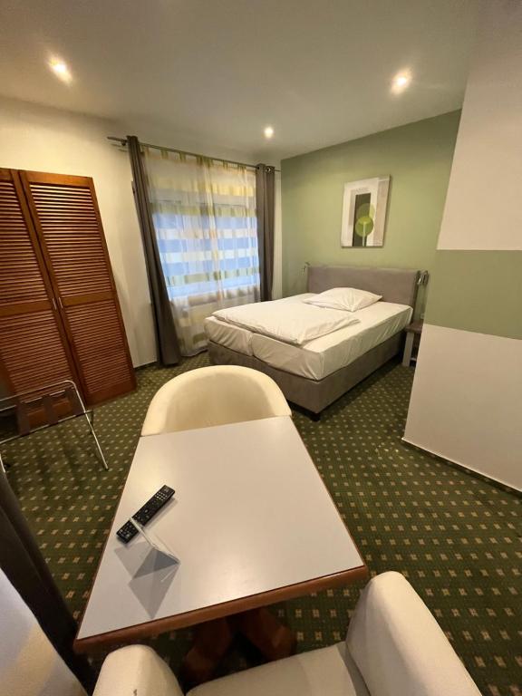 Postel nebo postele na pokoji v ubytování Hotel Aquarius Braunschweig