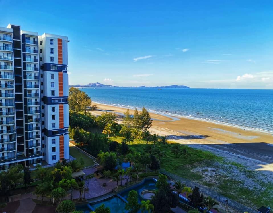 a view of a hotel and the beach at TimurBay Seafront Holiday Pool & Seaview in Kuantan