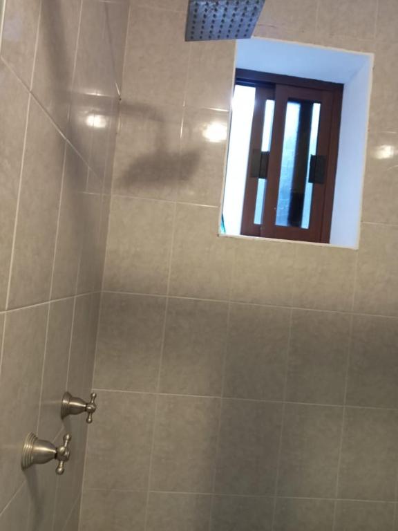 Koupelna v ubytování Hotel Suites La Fortuna
