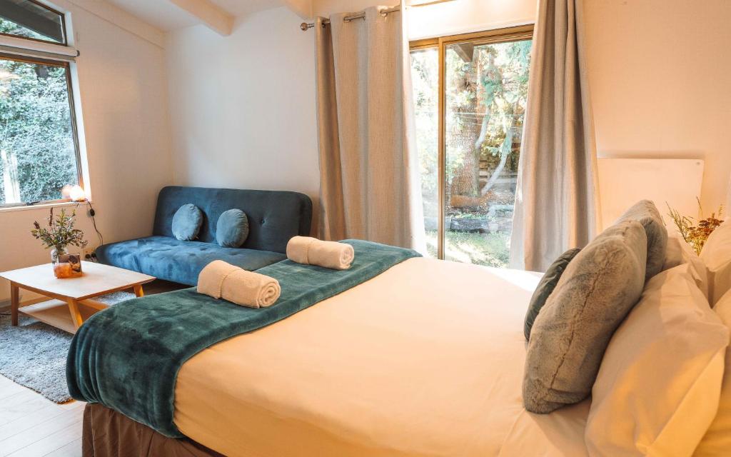 Postel nebo postele na pokoji v ubytování Ora Retreat