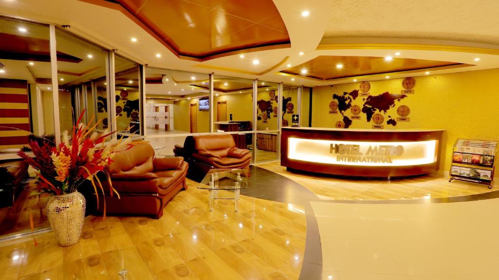 The lobby or reception area at Hotel Metro International