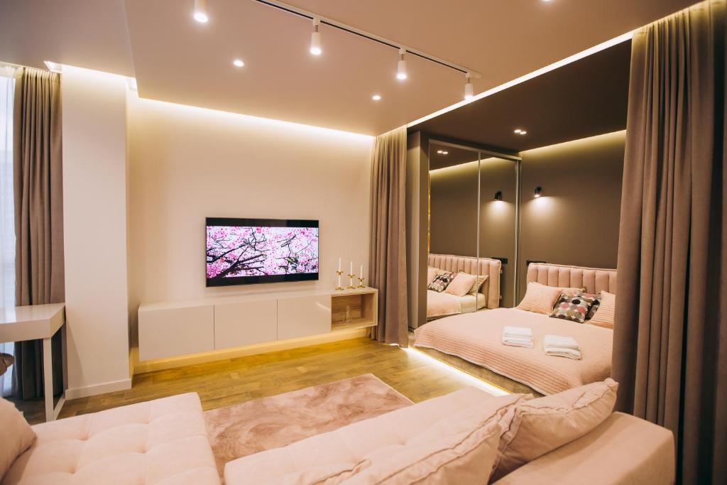 Кровать или кровати в номере Vodogray luxury apartments Елітний Житловий комплекс