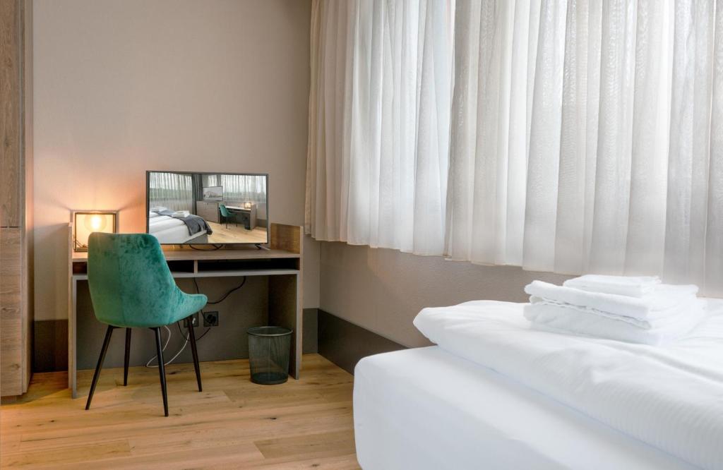 Postel nebo postele na pokoji v ubytování Wyna Motel