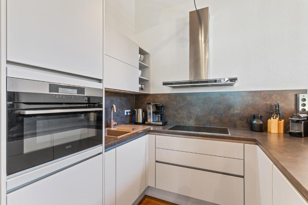 A kitchen or kitchenette at Chalet Wirklich Wunderbar