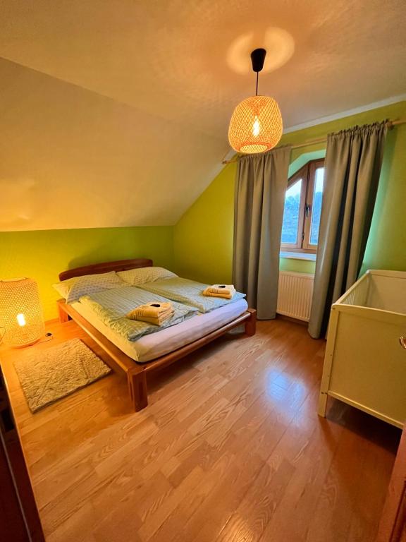 Villa Barwald tesisinde bir odada yatak veya yataklar