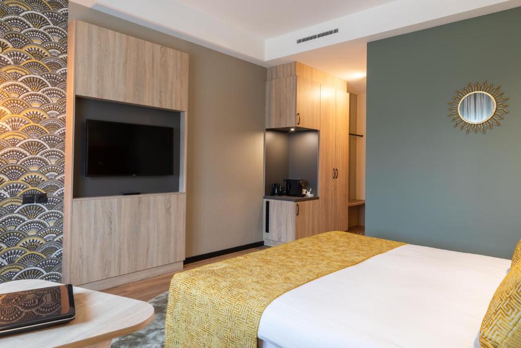TV a/nebo společenská místnost v ubytování Shanghai Hotel Holland