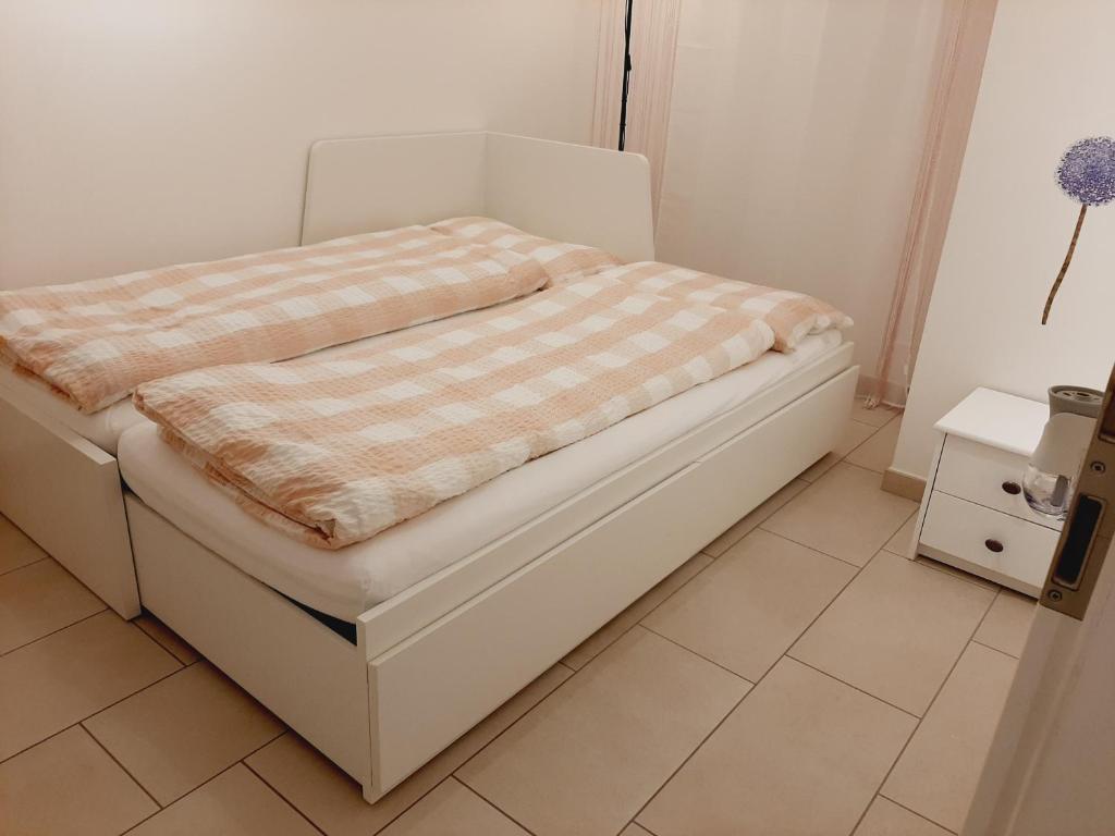 Postel nebo postele na pokoji v ubytování San Giulio Roveredo