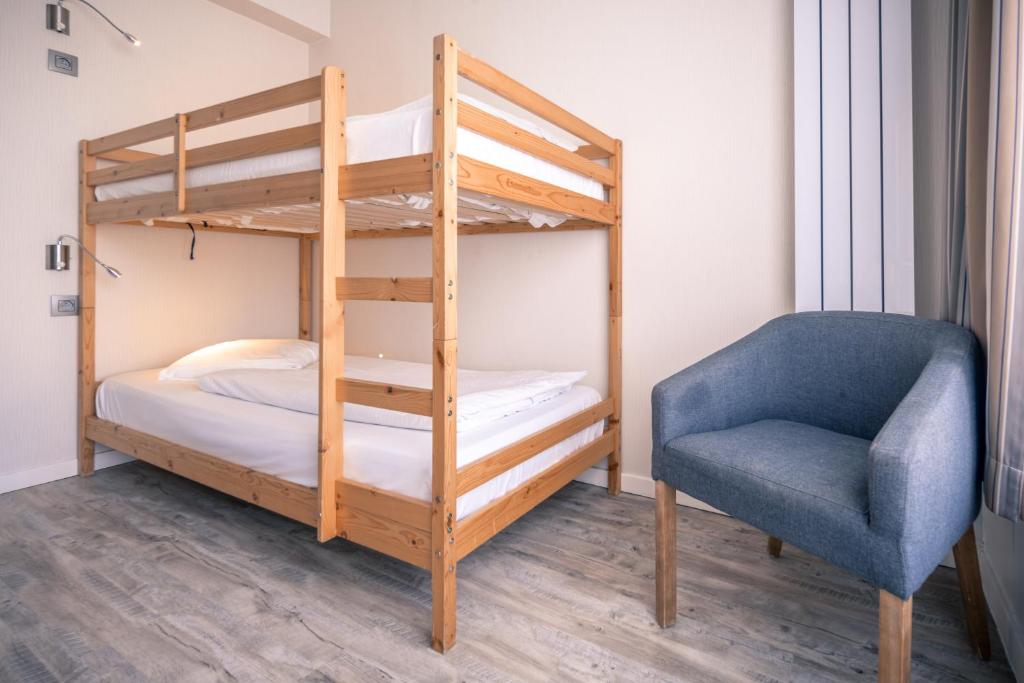 Postel nebo postele na pokoji v ubytování Hotel & Wellness Royal Astrid