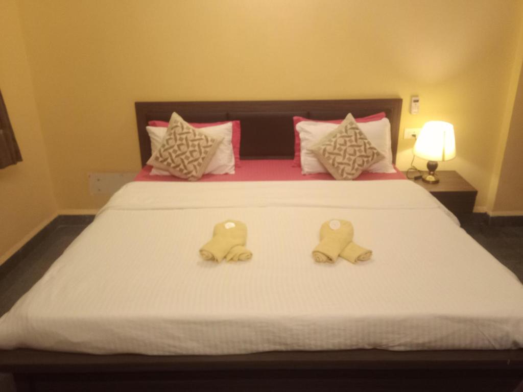 Postel nebo postele na pokoji v ubytování Jas Guest House