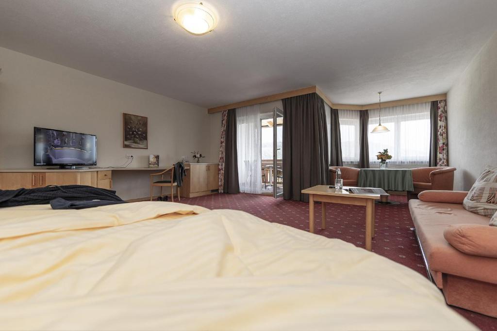 Postel nebo postele na pokoji v ubytování Aktiv-Hotel Traube