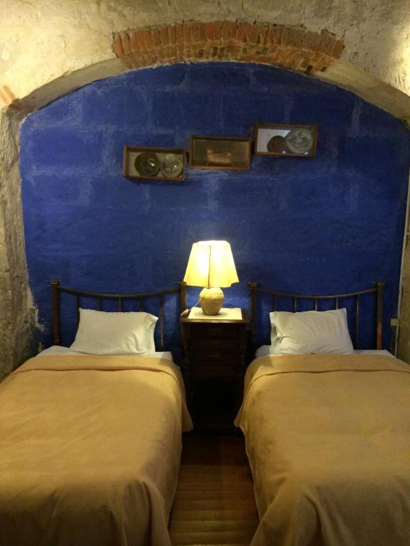 Postel nebo postele na pokoji v ubytování La Casa de Melgar