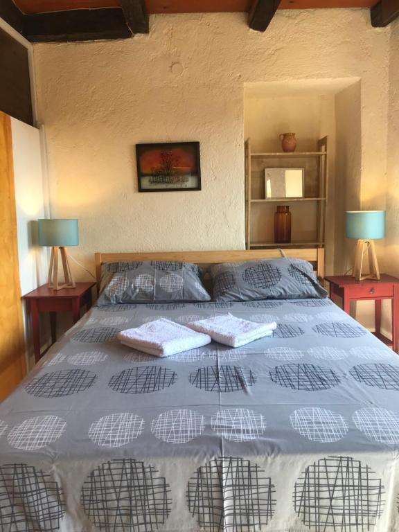 Łóżko lub łóżka w pokoju w obiekcie Casa Lucia