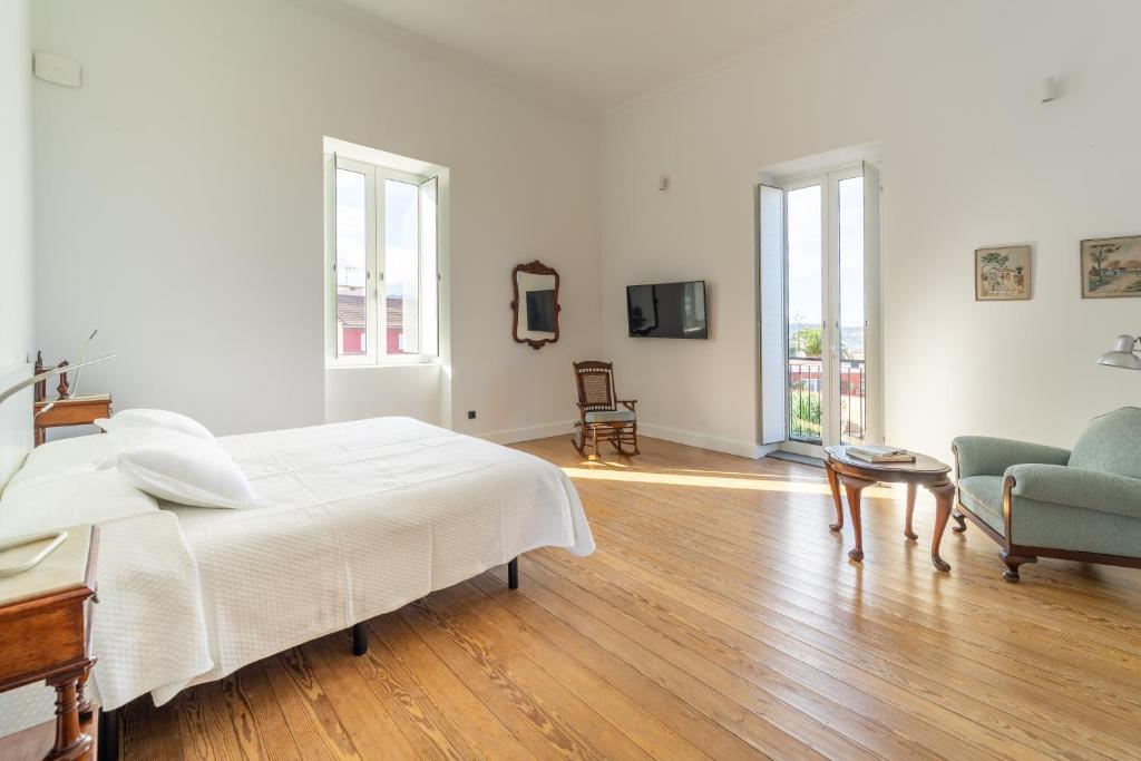 Postel nebo postele na pokoji v ubytování Albor Suites