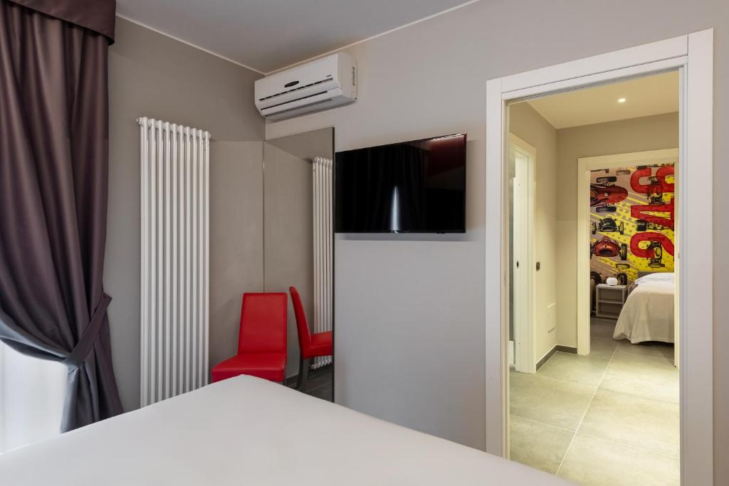 TV a/nebo společenská místnost v ubytování Hotel Maranello Village