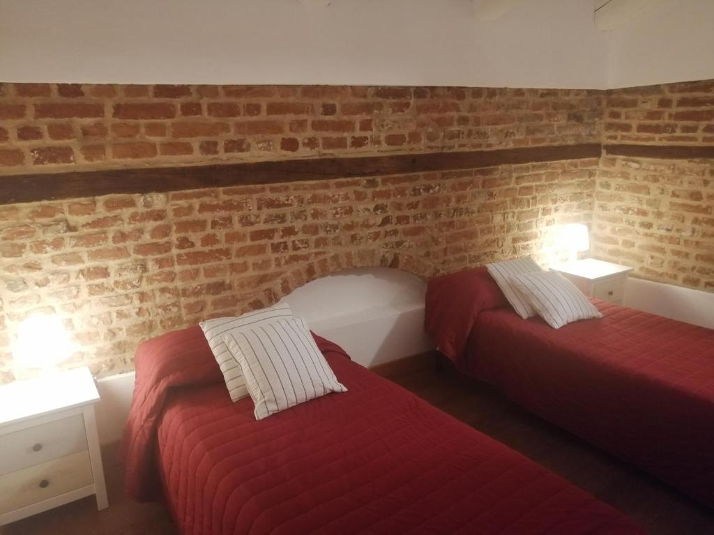 Postel nebo postele na pokoji v ubytování Casa Chiara