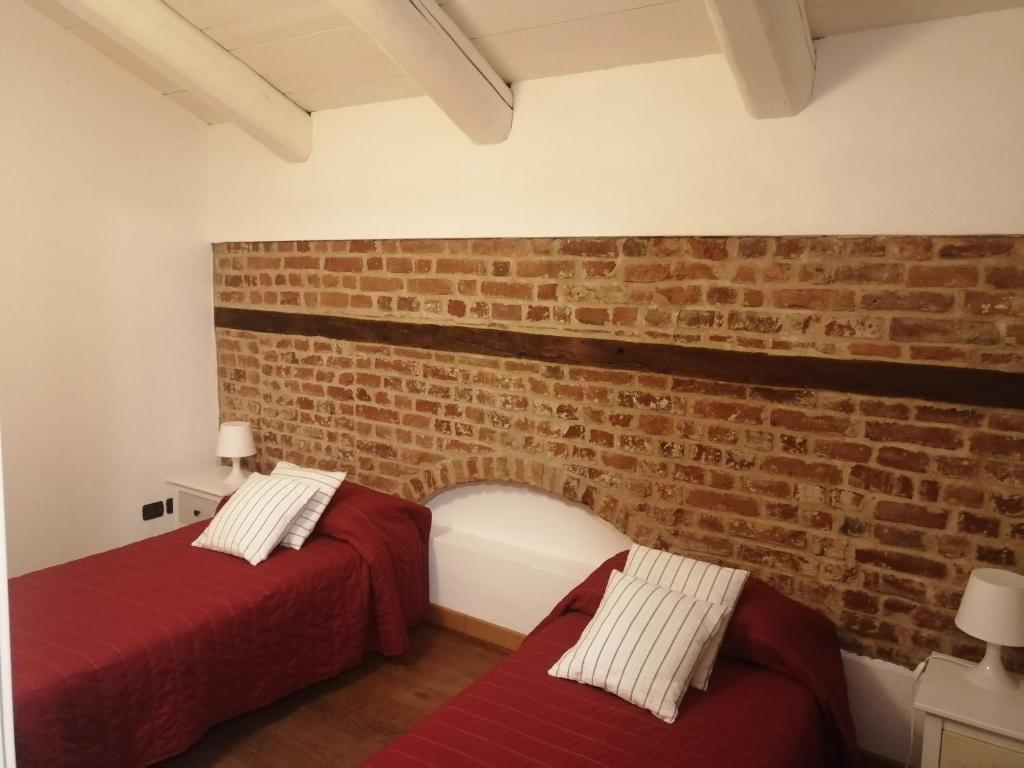 Postel nebo postele na pokoji v ubytování Casa Chiara