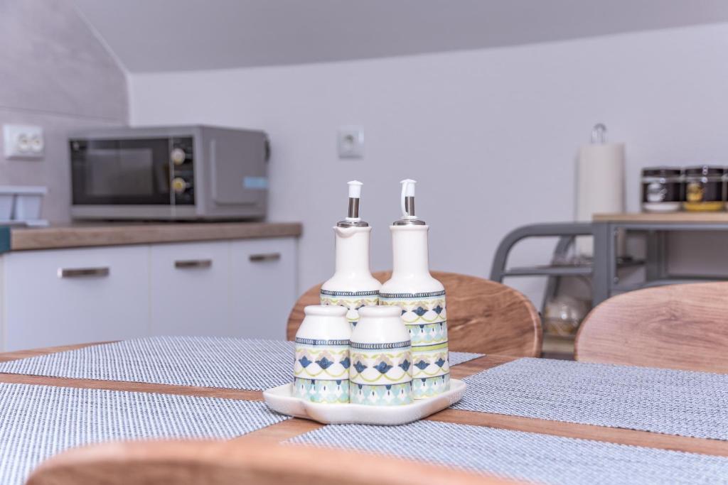 Kuchyň nebo kuchyňský kout v ubytování Apartmani Marijamagdalena