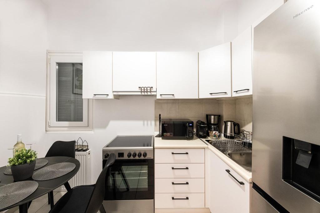 Kuchyň nebo kuchyňský kout v ubytování Porto Sea View Apartments - A. Svolou 22
