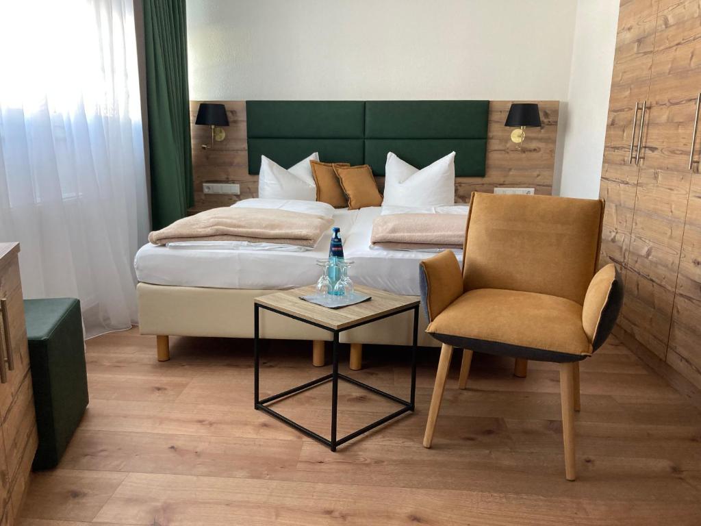 Postel nebo postele na pokoji v ubytování Hotel Hochfirst