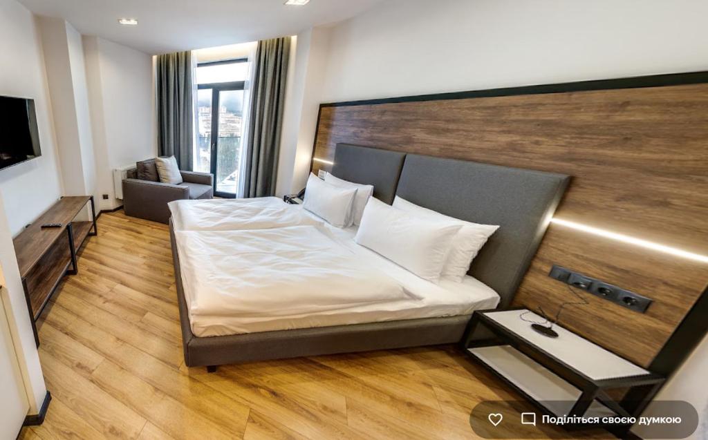 TV a/nebo společenská místnost v ubytování Mountain Residence Apartments & Chalet