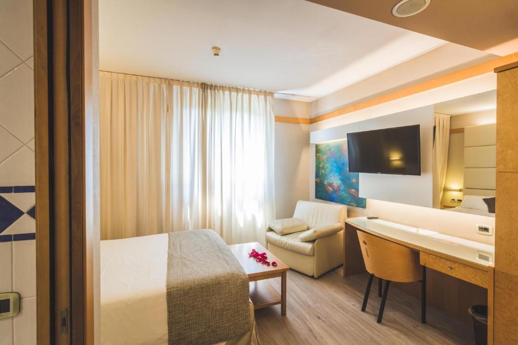 Posezení v ubytování Park Hotel Ai Pini & Restaurant Ai Pini