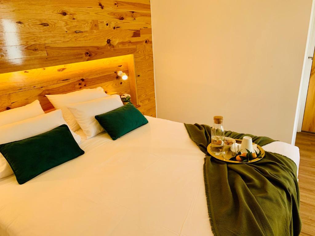 Postel nebo postele na pokoji v ubytování Furnas Spring Lodge