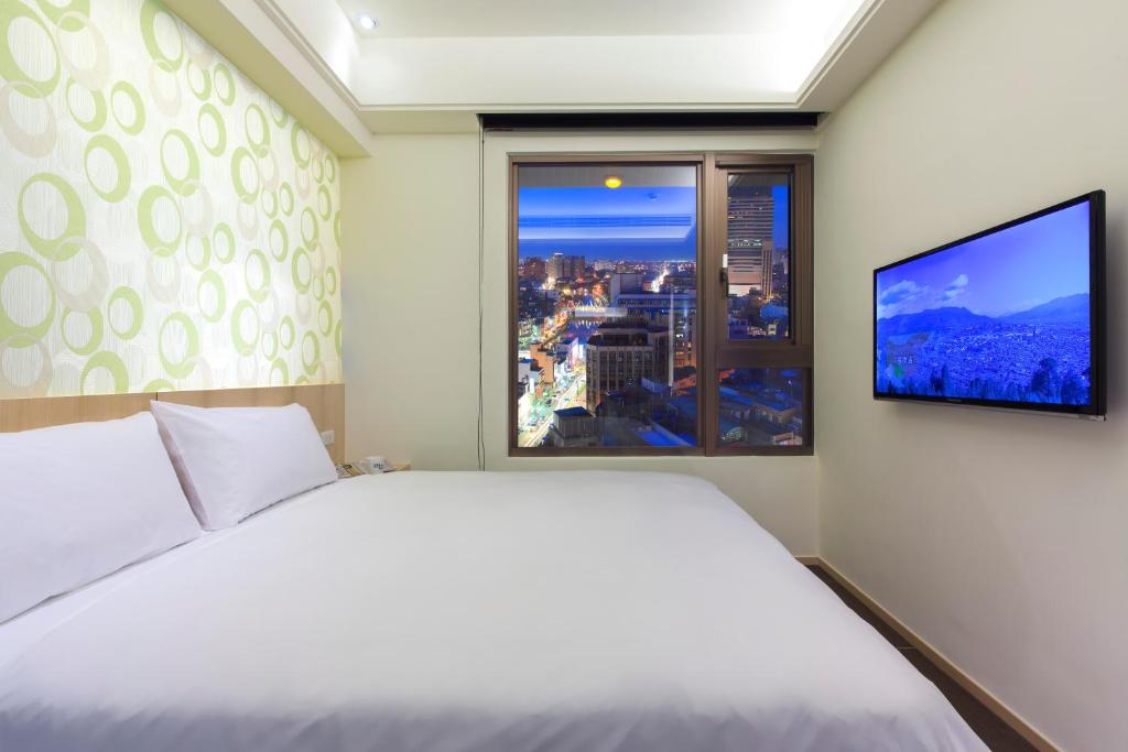 Voodi või voodid majutusasutuse Hotel MU toas
