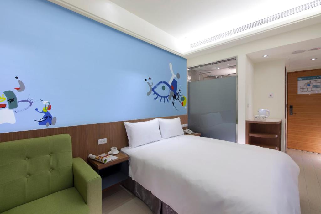 Voodi või voodid majutusasutuse Hotel MU toas