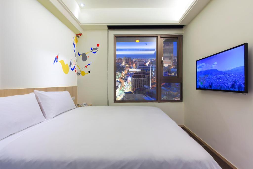 Voodi või voodid majutusasutuse Hotel MU toas