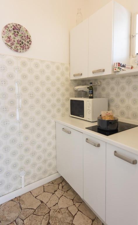 Kuchyňa alebo kuchynka v ubytovaní CASA ISA