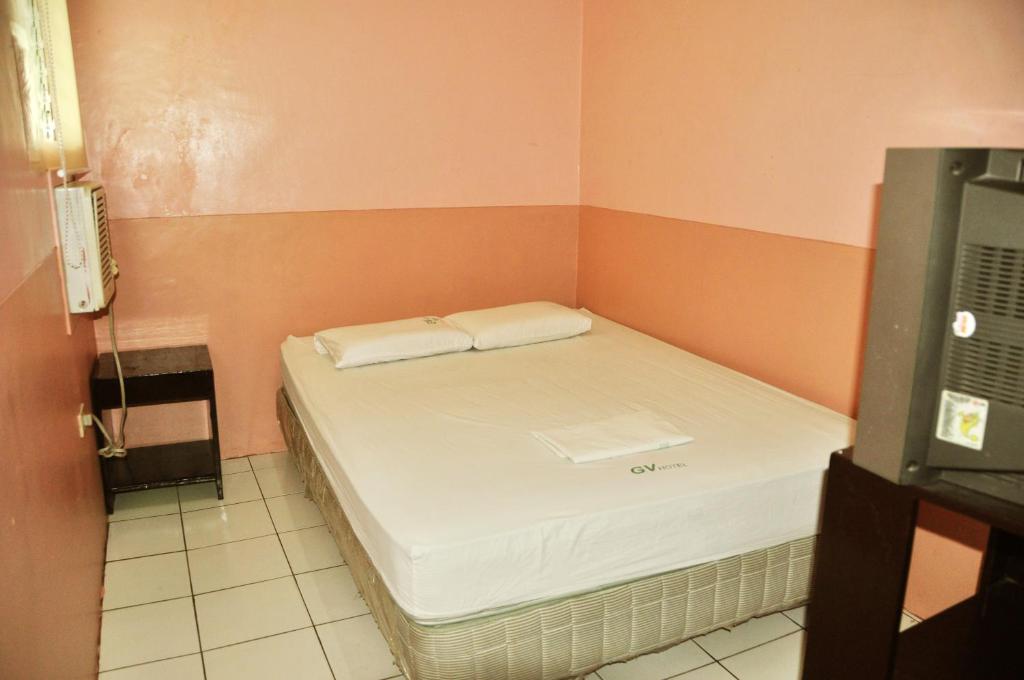 Postel nebo postele na pokoji v ubytování GV Hotel - Lapu-Lapu City